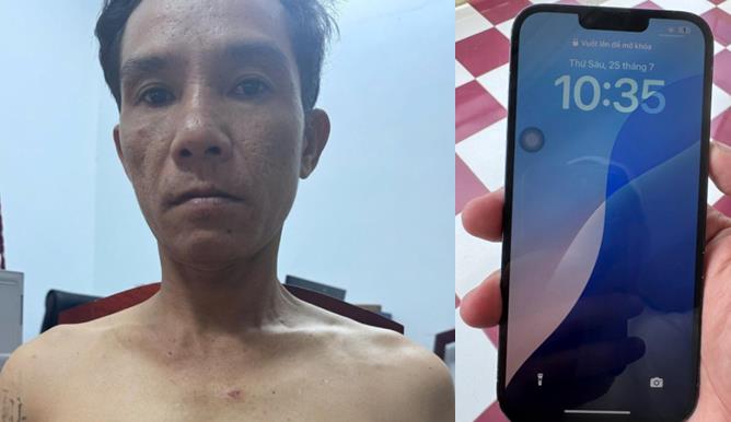 Đối tượng Nguyễn Thanh Dũng và chiếc ĐTDĐ tang vật.