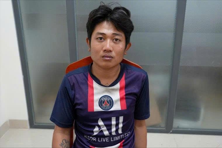 Nguyễn Quốc Long tại trụ sở công an - Ảnh công an cung cấp