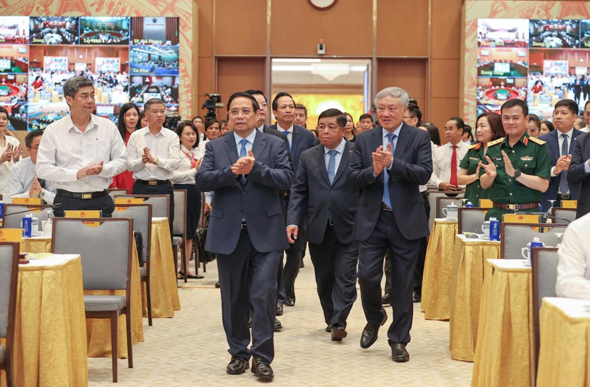 Bí thư Thành ủy Nguyễn Văn Quảng và Chủ tịch UBND thành phố Lương Nguyễn Minh Triết đồng chủ trì điểm cầu Đà Nẵng.