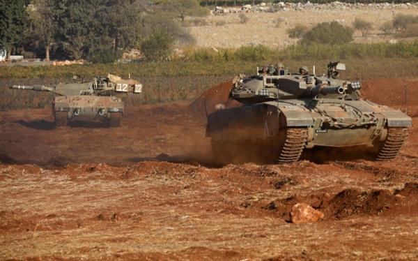 Xe tăng Israel húc đổ cổng căn cứ LHQ ở Lebanon